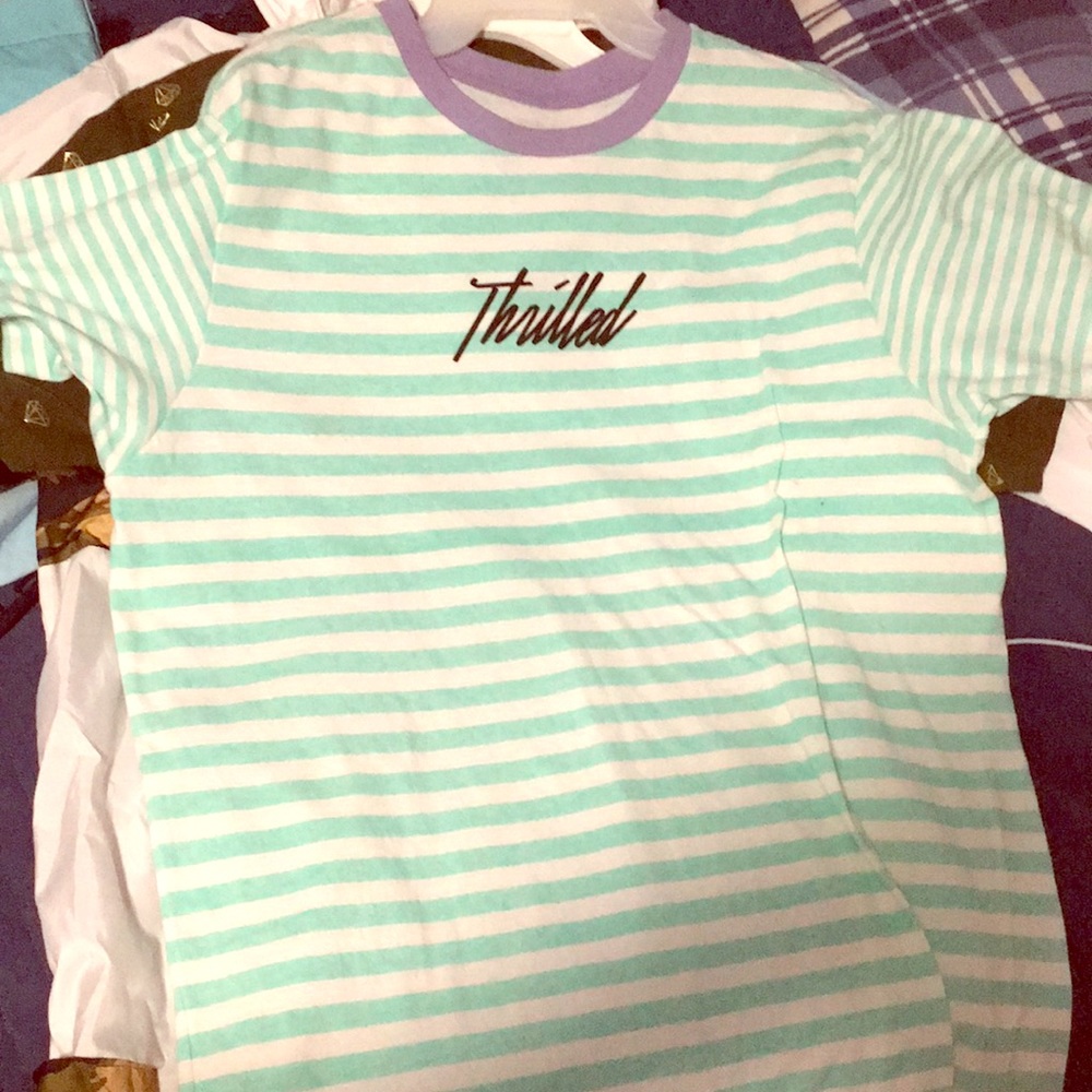 Never worn Large THRILLED